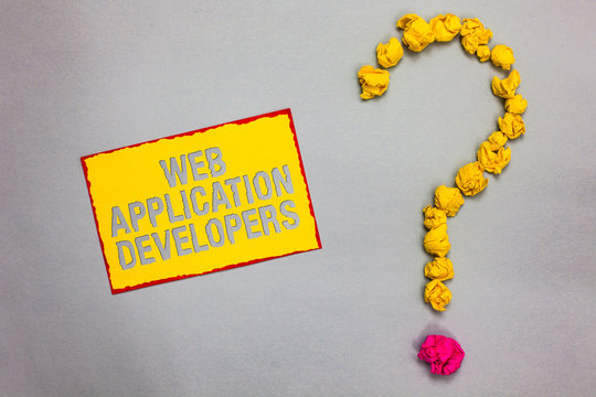 Writing note showing Web Application Developers. Business photo showcasing Internet programming experts Technology software Red bordered yellow sticky note yellow paper lumps form question mark