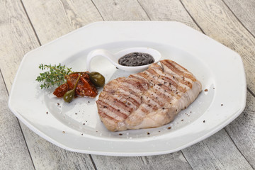 Grilled pork steak with pepper sauce