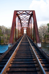 Fototapeta na wymiar old railway bridge in the forest