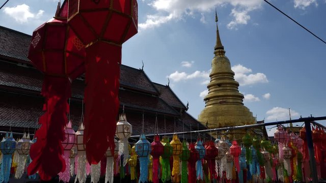 yi peng festival amazing tourism Thailand in Wat Pra That Hariphunchai decoration with colorful traditional lanna lantern, Lamphun province