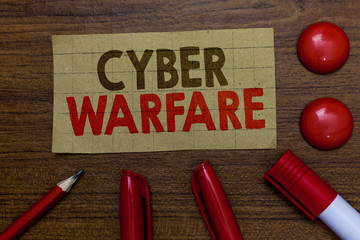 Handwriting text writing Cyber Warfare. Concept meaning Virtual War Hackers System Attacks Digital...