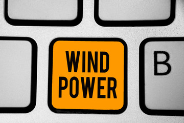 Text sign showing Wind Power. Conceptual photo use of air flowto provide mechanical power to turn generators Keyboard orange key Intention create computer computing reflection document