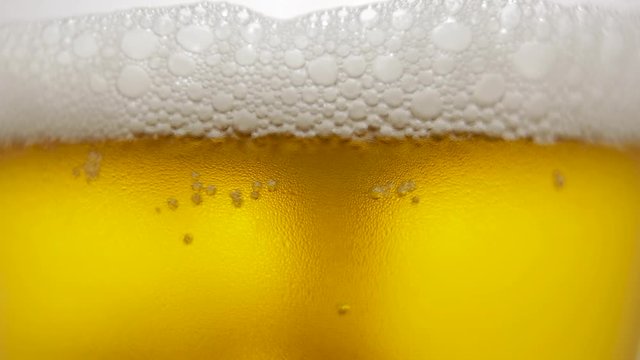 Cool fresh beer with condensation drops. beer in glass