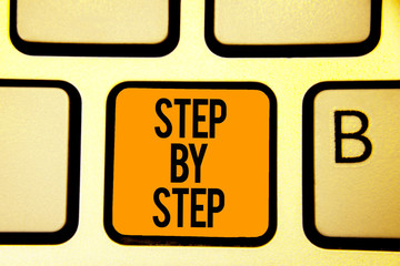 Text sign showing Step By Step. Conceptual photo Slow progress Road to success Direction development Growth Keyboard orange key Intention create computer computing reflection document