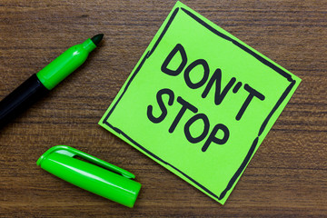 Conceptual hand writing showing Don t not Stop. Business photo showcasing Continue what had been...