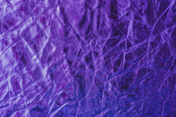 The texture of the crinkled fabric in neon color.