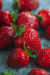 Top of view fresh strawberry on concrete blue board