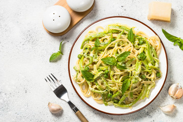 Pasta spaghetti with zucchini top view.