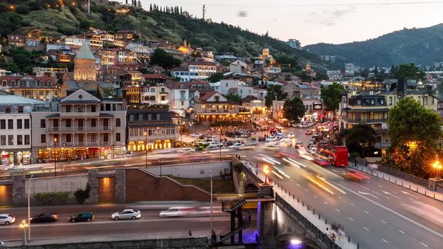 Timelapse view of the Tbilisi city center, Metekhi Bridge and Narikala Fortress, Georgia.
