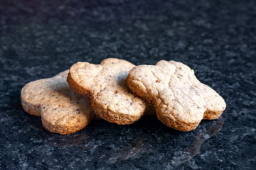 Nuts cookies. Walnut cookies on a dark marble table.