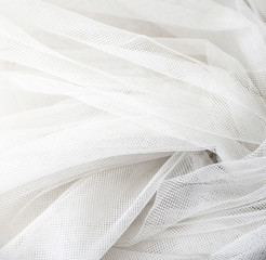 Wedding White Silk transparent fabric. Abstract soft chiffon texture background. Soft white chiffon with curve and wave pattern.