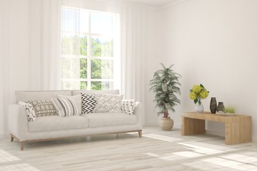 Stylish room in white color with sofa and summer landscape in window. Scandinavian interior design. 3D illustration