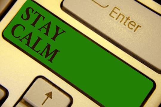 Conceptual hand writing showing Stay Calm. Business photo text Maintain in a state of motion smoothly even under pressure Keyboard green key create computer computing reflection document