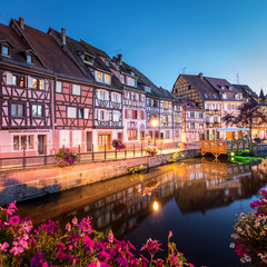 colorful night view of Colmar, Alsace, France with flowers