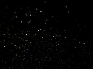 Glitter vintage lights background. Abstract blur background.