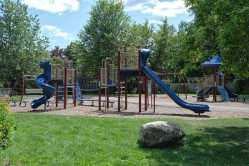 Children's playground, slides, bridge, playhouse, no people