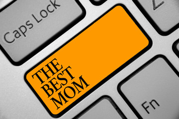 Conceptual hand writing showing The Best Mom. Business photo showcasing Appreciation for your mother love feelings compliment Keyboard orange key computer computing reflection document