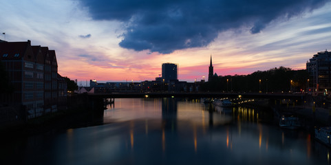 panorama view of the schlachte and überseestadt in Bremen during blue hour/Sunset