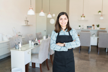 Confident Expert Standing In Nail Salon