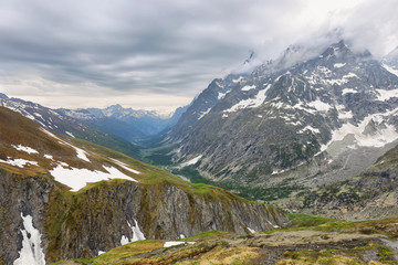 View of mountain peaks with glaciers in Val Ferret, Aosta valley, Italy