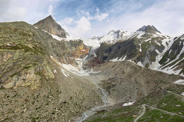 View of mountain peaks with glaciers in Val Ferret, Aosta valley, Italy