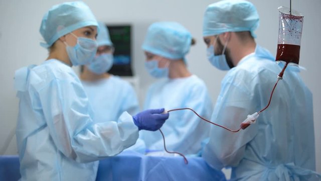 Intravenous drip in operation room, blood transfusion during surgery, hospital