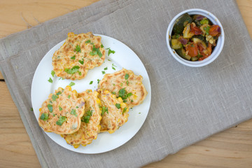 fried corn fritters with spicy zucchini salsa