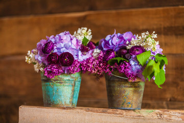 Floral bouquet in a barn setting.
