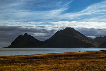 Vestrahorn mountain seen from back near the sunset in Iceland