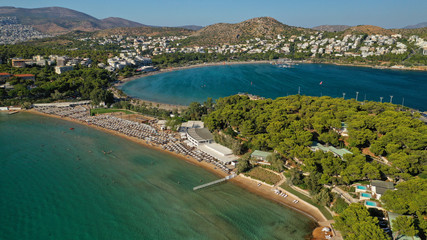 Aerial drone photo of famous paradise celebrity sandy beach of Astir or Asteras in south Athens...