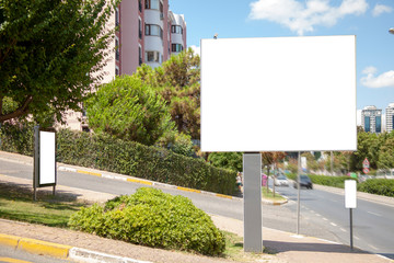 advertising board on asphalt road