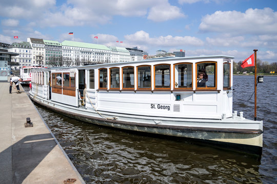 HAMBURG, GERMANY - APRIL 9, 2019: Steamer St. Georg on the Inner Alster in Hamburg, Germany. The St. Georg is the oldest steamboat in Germany capable of driving.