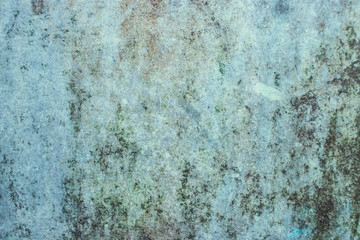 Green grunge painted wall surface worn weathered dirty old rough vintage background surface texture