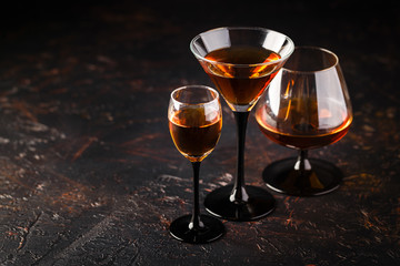 Set of strong alcoholic drinks in glasses