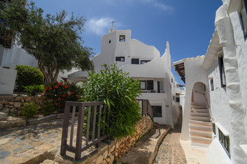 Among the white houses of Binibequer vell in Menorca