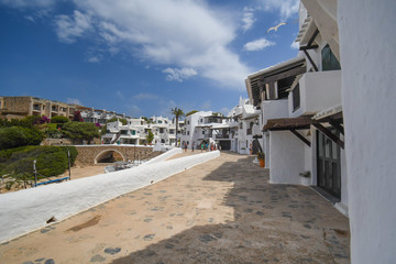 Among the white houses of Binibequer vell in Menorca