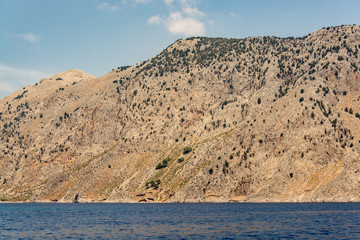 Boat trip along the shore of the island of Symi