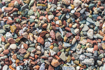 Pebbles at the beach. Stone background image.