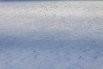 texture and snow background, selective focus, caked snow smooth and solid white.