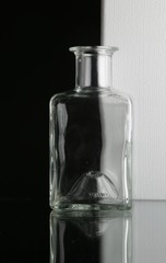 Glass bottles on white background in a studio