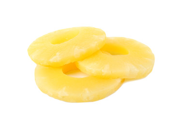 Slices of delicious sweet canned pineapple on white background