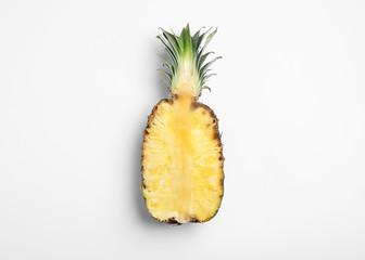 Half of raw pineapple on white background, top view