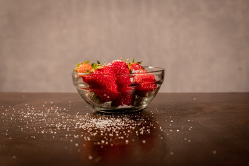 red strawberries  in a vase