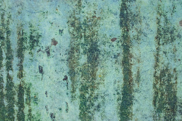 Green grunge painted wall surface worn weathered dirty old rough vintage background surface texture