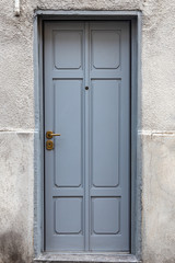 traditional wooden grey house door Como,  Europe