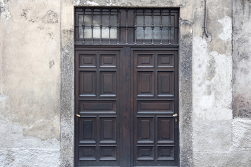 traditional wooden  house door Monza, Italy