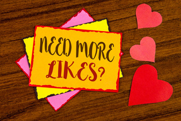 Text sign showing Need More Likes Question. Conceptual photo Social media create more fans followers community written Sticky note paper wooden background Hearts next to it.