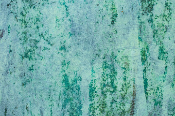 Green grunge painted wall surface worn weathered dirty old rough vintage background surface texture