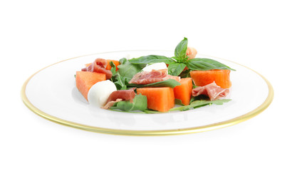 Fresh melon with prosciutto, mozzarella and basil on white background