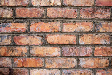 Orange worn grunge brick wall surface background weathered dirty distressed texture